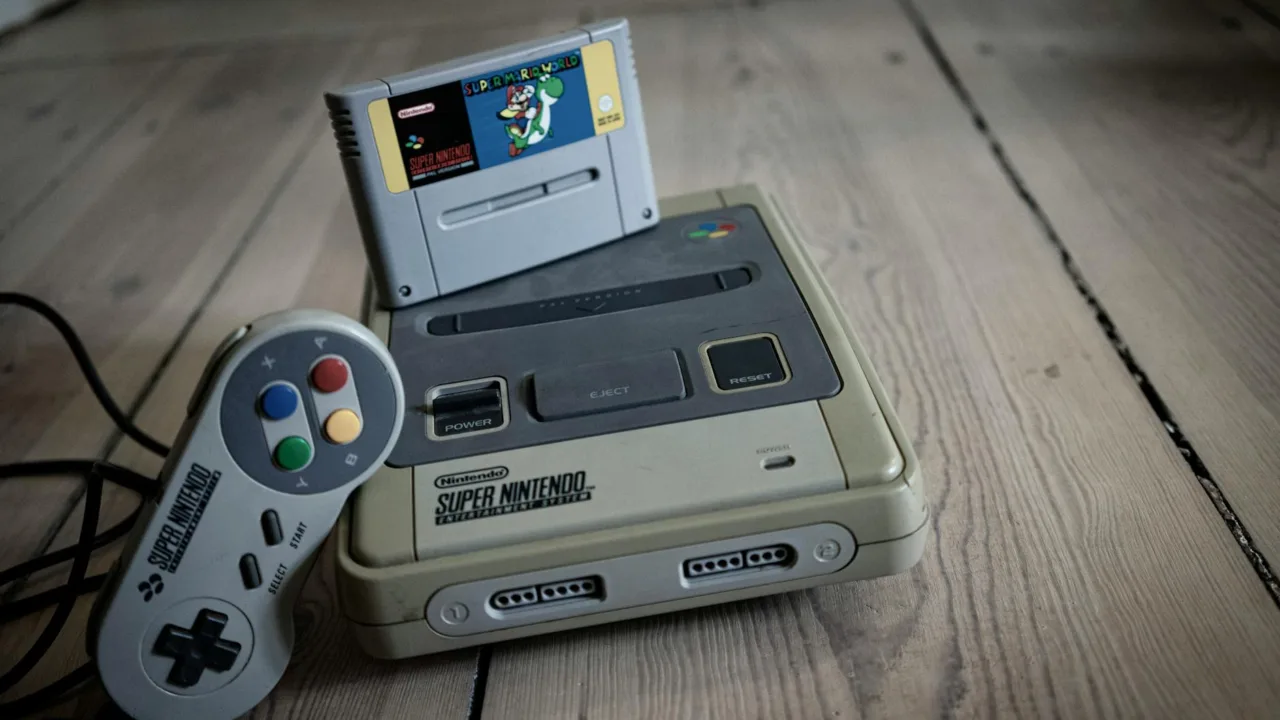 old video game pad with controller and cassette